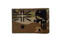 Multicam patch with black silhouette design on a white background